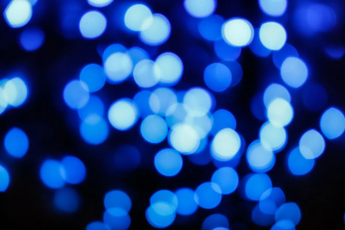 Blurred blue lights glowing in the dark