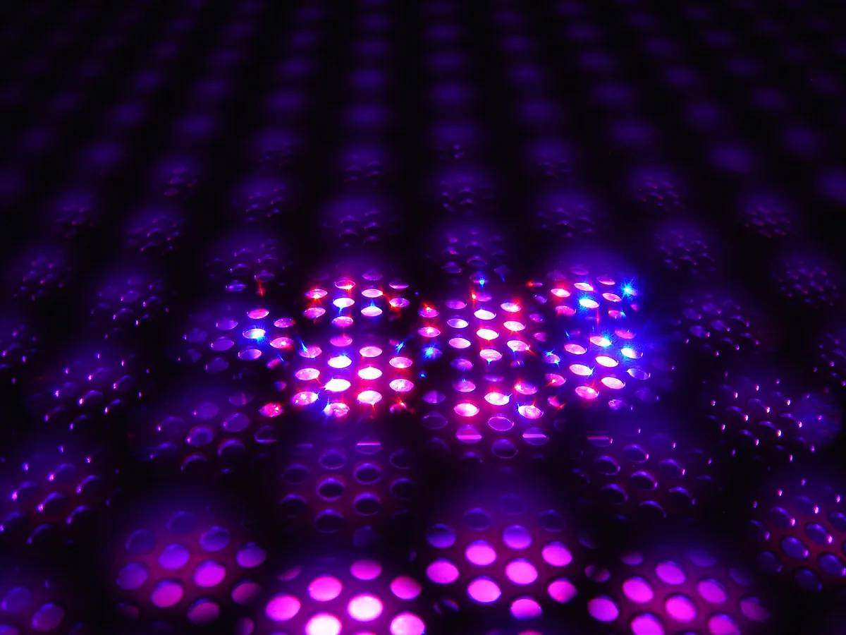 Grid of glowing purple LED lights